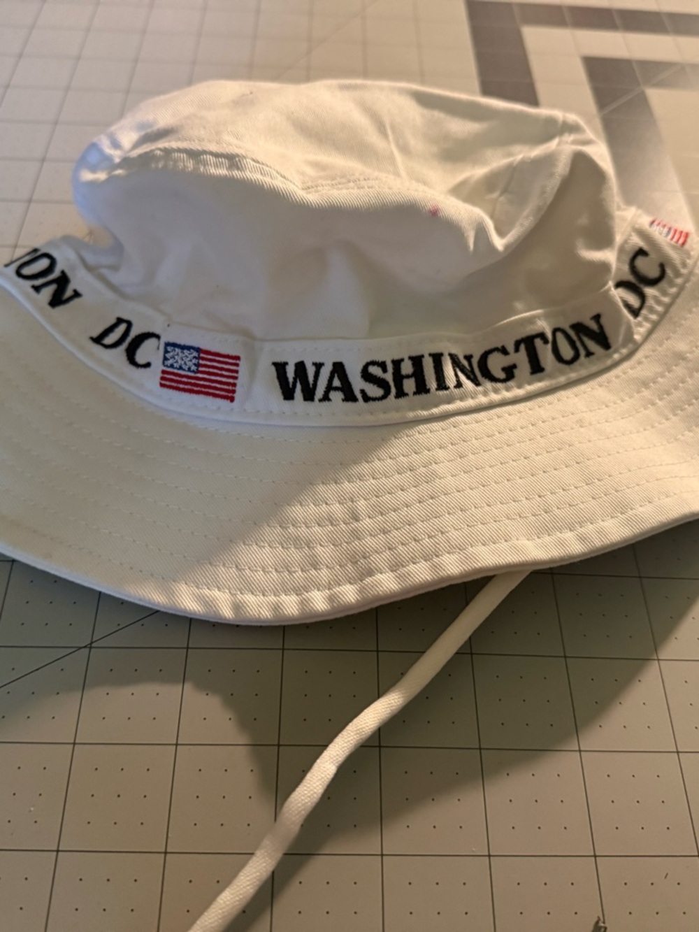 DC White Bucket Hat with Black and Red Logo